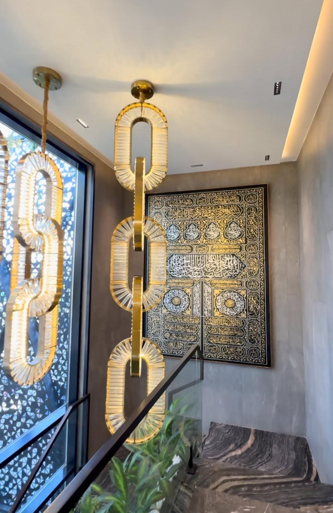 Luxury Crystal and Metal Chain Pendant Chandelier for High Ceilings with Modern Finish - Zelno Lighting