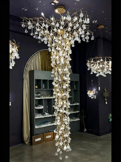 Nature-inspired Brass Tree Chandelier with Glazed Glass Flowers - Zelno Lighting