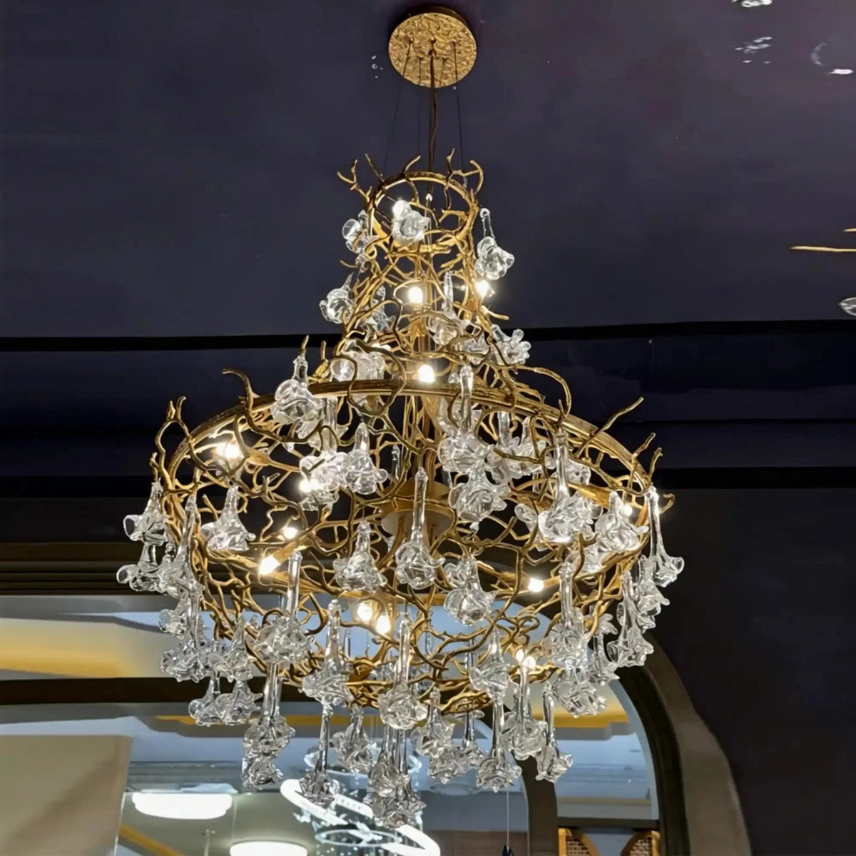 Nature-inspired Brass Tree Chandelier with Glazed Glass Flowers - Zelno Lighting