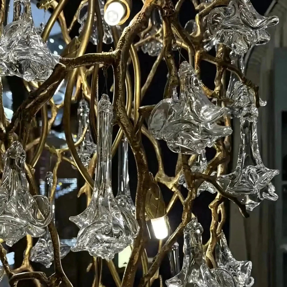 Nature-inspired Brass Tree Chandelier with Glazed Glass Flowers - Zelno Lighting